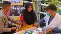 polri-beri-pelayanan-kesehatan-gratis-untuk-korban-banjir-di-aceh-1764668296844_169